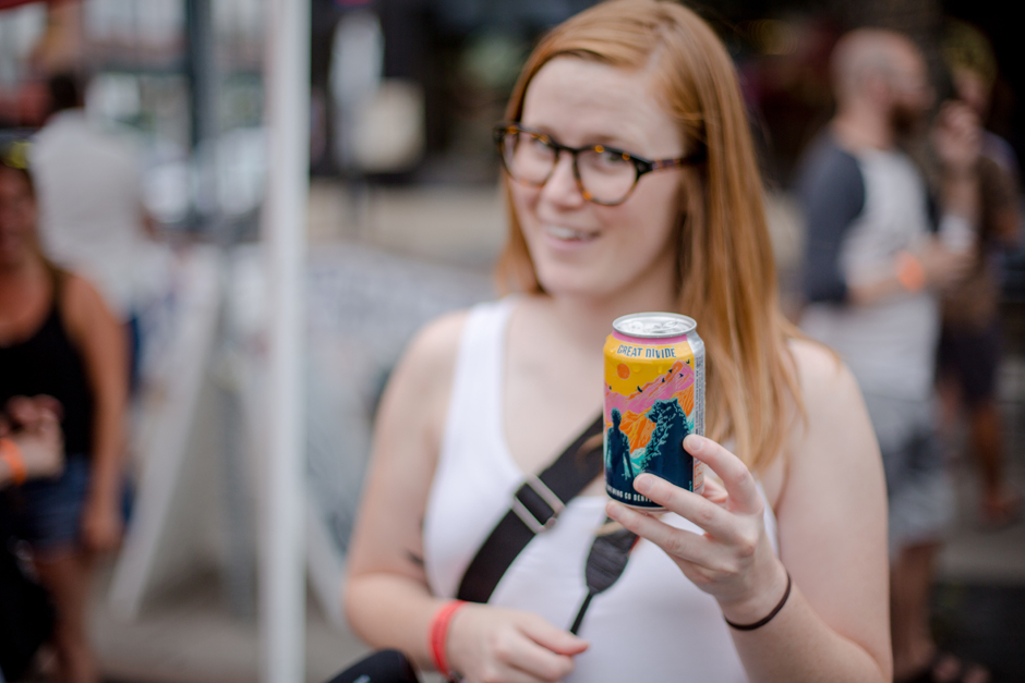 tricia holding a great divide pale ale