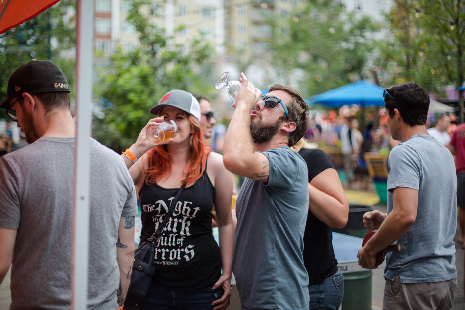 chugging a beer at great divide block party